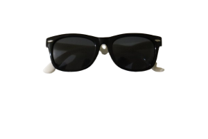 Baby wearing Premium Ultraflex Sunnies – Black & White, flexible baby sunglasses with UV protection