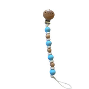 Plush Bubs Baby Blue Silicone Dummy Clip clipped to baby’s clothing